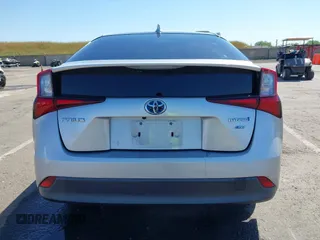 2021 Toyota Prius L Eco with VIN JTDKAMFUXM3144991, listed as a IAAI auction lot 42147025 with 106,466 mi miles and . Bid and sale history available at DreamBid. Image 15.