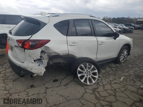 2015 Mazda CX-5 Grand Touring with VIN JM3KE2DY6F0504784, listed as a Copart auction lot 47671705 with 174,682 mi miles and Salvage Title. Bid and sale history available at carsss.com. Image 3.