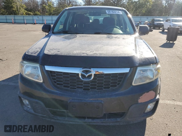 2011 Mazda Tribute Touring with VIN 4F2CY0C73BKM02889, listed as a Copart auction lot 68182214 with 139,491 mi miles and Clean Title. Bid and sale history available at carsss.com. Image 5.