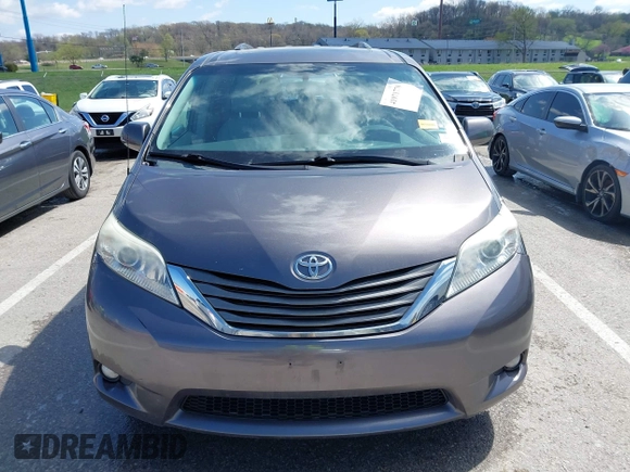 2012 Toyota Sienna XLE AAS with VIN 5TDYK3DC8CS263406, listed as a IAAI auction lot 41971770 with 186,394 mi miles. Bid and sale history available at carsss.com. Image 12.