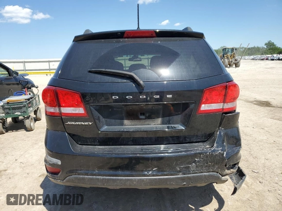 2019 Dodge Journey SE with VIN 3C4PDCBB0KT747252, listed as a Copart auction lot 56652425 with 72,581 mi miles and Salvage title. Bid and sale history available at DreamBid. Image 6.