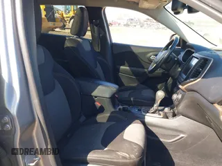 2014 Jeep Cherokee Latitude with VIN 1C4PJMCS7EW310179, listed as a IAAI auction lot 41757831 with 134,087 mi miles and . Bid and sale history available at DreamBid. Image 5.
