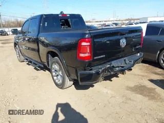 2022 Ram 1500 Laramie with VIN 1C6SRFRT7NN180979, listed as a IAAI auction lot 41824340 with 32,446 mi miles and . Bid and sale history available at DreamBid. Image 3.