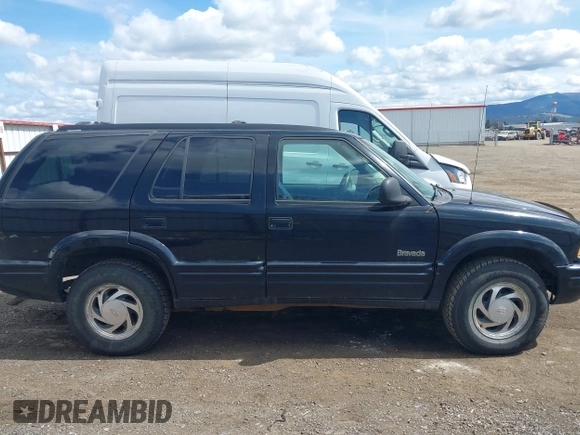 1997 Oldsmobile Bravada z VIN 1GHDT13W3V2707243, wystawiony jako IAAI lot #42024114 z przebiegiem 185 219 mil mil oraz . Historia ofert i sprzedaży dostępna na DreamBid. Obrazek 13.