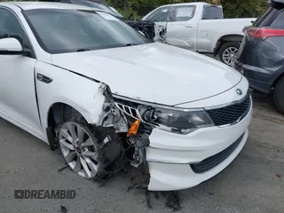 2018 Kia Optima LX with VIN 5XXGT4L30JG256660, listed as a IAAI auction lot 42005531 with 100,337 mi miles and . Bid and sale history available at DreamBid. Image 6.