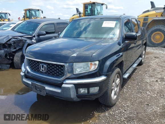 2011 Honda Ridgeline RTL with VIN 5FPYK1F54BB011472, listed as a IAAI auction lot 42112512 with 194,974 mi miles and . Bid and sale history available at DreamBid. Image 17.