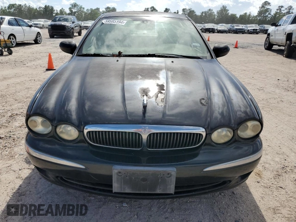 2003 Jaguar X-Type 2.5L Manual z VIN SAJEA51D73XD21289, wystawiony jako Copart lot #59583194 z przebiegiem 70 333 mil mil oraz Czysty tytuł • Clean title. Historia ofert i sprzedaży dostępna na DreamBid. Obrazek 5.