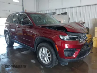 2023 Jeep Grand Cherokee Laredo with VIN 1C4RJHAG5PC669520, listed as a IAAI auction lot 41574918 with 22,615 mi miles and . Bid and sale history available at DreamBid. Image 1.