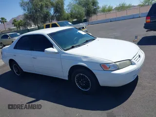 1999 Toyota Camry LE z VIN 4T1BG22K0XU904122, wystawiony jako IAAI lot #42305293 z przebiegiem 243 182 mil mil oraz . Historia ofert i sprzedaży dostępna na DreamBid. Obrazek 13.