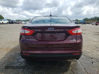 2013 Ford Fusion SE Hybrid z VIN 3FA6P0LU7DR197801, wystawiony jako Copart lot #60468095 z przebiegiem 169 215 mil mil oraz Szkoda całkowita • Salvage title. Historia ofert i sprzedaży dostępna na DreamBid. Obrazek 6.