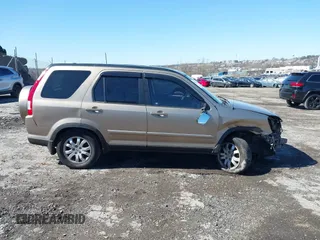 2005 Honda CR-V EX SE with VIN JHLRD78965C011391, listed as a IAAI auction lot 41820990 with 206,623 mi miles. Bid and sale history available at carsss.com. Image 14.