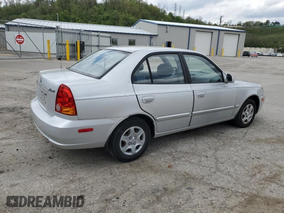 2004 Hyundai Accent GL with VIN KMHCG45C94U515186, listed as a Copart auction lot 52697284 with 49,236 mi miles and Salvage Title. Bid and sale history available at carsss.com. Image 3.
