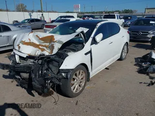 2015 Kia Optima EX with VIN 5XXGN4A73FG377402, listed as a IAAI auction lot 41209243 with 217,948 mi miles. Bid and sale history available at carsss.com. Image 2.