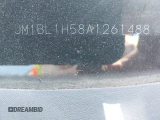 2010 Mazda 3 S Sport z VIN JM1BL1H58A1261488, wystawiony jako IAAI lot #42155921 z przebiegiem 165 300 mil mil oraz . Historia ofert i sprzedaży dostępna na DreamBid. Obrazek 9.