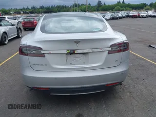 2014 Tesla Model S 60 with VIN 5YJSA1S13EFP53662, listed as a IAAI auction lot 42249930 with Not provided miles and . Bid and sale history available at DreamBid. Image 15.