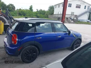 2016 MINI Countryman S with VIN WMWZC3C50GWT08698, listed as a IAAI auction lot 42493302 with 61,306 mi miles and . Bid and sale history available at DreamBid. Image 13.