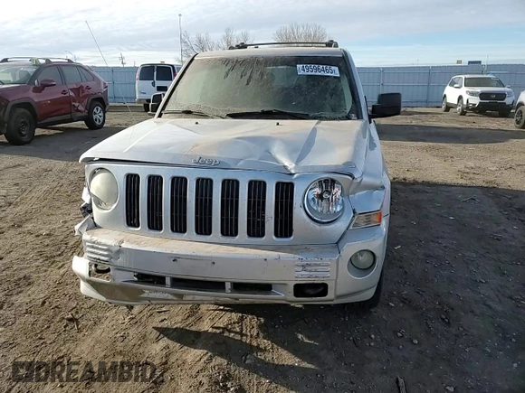2009 Jeep Patriot with VIN 1J8FF48B49D221606, listed as a Copart auction lot 49596465 with 168,305 mi miles and Salvage title. Bid and sale history available at DreamBid. Image 12.