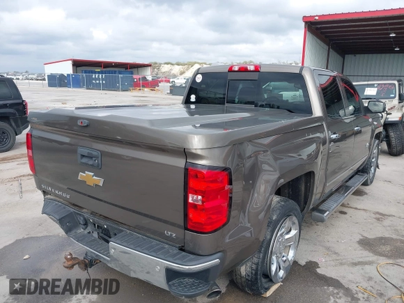 2015 Chevrolet Silverado 1500 LTZ with VIN 3GCPCSEC6FG408754, listed as a IAAI auction lot 41514369 with 140,928 mi miles and . Bid and sale history available at DreamBid. Image 4.
