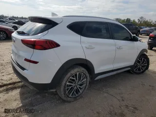 2020 Hyundai Tucson Sport with VIN KM8J33ALXLU093849, listed as a Copart auction lot 82670704 with 87,584 mi miles and Clean Title. Bid and sale history available at carsss.com. Image 3.
