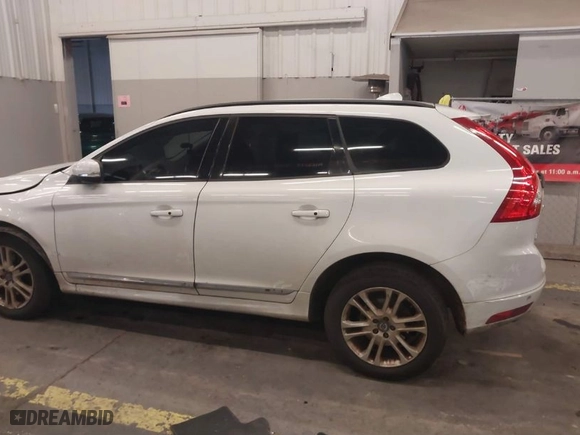 2016 Volvo XC60 T5 Drive-E with VIN YV440MDJ0G2920301, listed as a IAAI auction lot 40956289 with 137,565 mi miles. Bid and sale history available at carsss.com. Image 15.