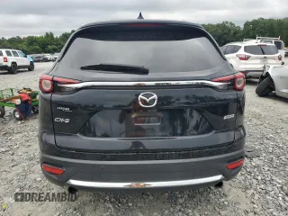 2016 Mazda CX-9 Grand Touring z VIN JM3TCADY7G0122768, wystawiony jako Copart lot #65624615 z przebiegiem 82 388 mil mil oraz Czysty tytuł • Clean title. Historia ofert i sprzedaży dostępna na DreamBid. Obrazek 6.