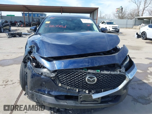 2021 Mazda CX-30 Select with VIN 3MVDMABL5MM272418, listed as a IAAI auction lot 41783355 with 25,429 mi miles and . Bid and sale history available at DreamBid. Image 6.