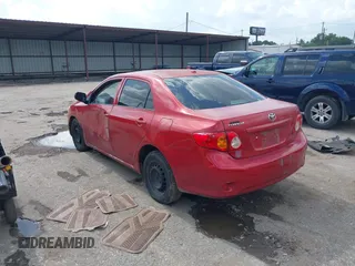 2009 Toyota Corolla with VIN JTDBL40E99J029281, listed as a IAAI auction lot 42460666 with 215,845 mi miles and . Bid and sale history available at DreamBid. Image 3.