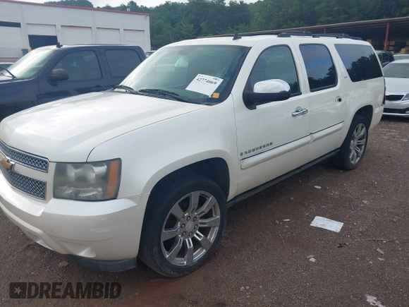 2008 Chevrolet Suburban LTZ z VIN 1GNFC160X8R221599, wystawiony jako IAAI lot #42774069 z przebiegiem 135 406 mil mil oraz . Historia ofert i sprzedaży dostępna na DreamBid. Obrazek 2.