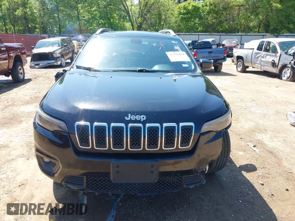 2019 Jeep Cherokee Latitude Plus z VIN 1C4PJLLBXKD123116, wystawiony jako IAAI lot #41981044 z przebiegiem 173 232 mil mil oraz . Historia ofert i sprzedaży dostępna na DreamBid. Obrazek 13.