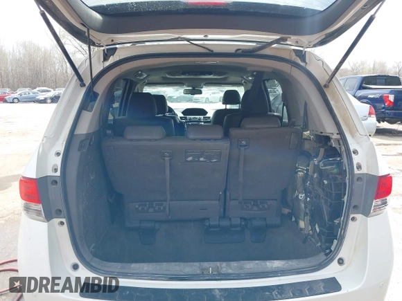 2014 Honda Odyssey Touring с VIN 5FNRL5H94EB057681, выставлен на аукционе IAAI как лот 41828000 с пробегом 249 350 миль миль и . История ставок и продаж доступна на DreamBid. Изображение 12.