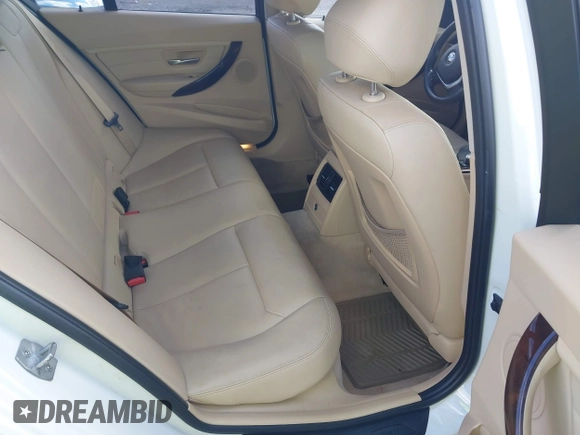 2014 BMW 3 Series 328i with VIN WBA3A5C5XEJ463938, listed as a IAAI auction lot 42103330 with 194,263 mi miles and . Bid and sale history available at DreamBid. Image 8.
