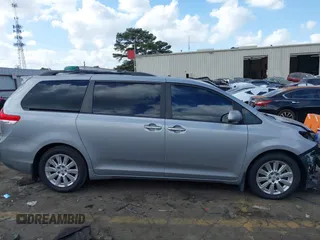 2011 Toyota Sienna XLE AAS with VIN 5TDYK3DC8BS157794, listed as a IAAI auction lot 40759823 with 211,716 mi miles and . Bid and sale history available at DreamBid. Image 13.