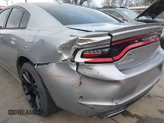 2015 Dodge Charger SXT with VIN 2C3CDXHG4FH884058, listed as a IAAI auction lot 41724894 with 202,701 mi miles and . Bid and sale history available at DreamBid. Image 18.