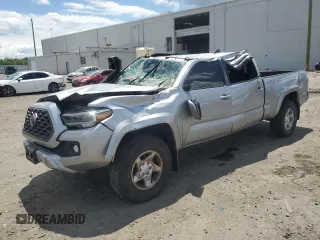 2020 Toyota Tacoma SR5 with VIN 3TMDZ5BN5LM090020, listed as a Copart auction lot 58192835 with 107,156 mi miles and Salvage title. Bid and sale history available at DreamBid. Image 1.