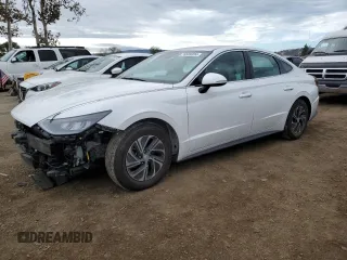 2022 Hyundai Sonata Hybrid Blue with VIN KMHL24JJ0NA037651, listed as a Copart auction lot 76569394 with 181,681 mi miles and Salvage Title. Bid and sale history available at carsss.com. Image 1.