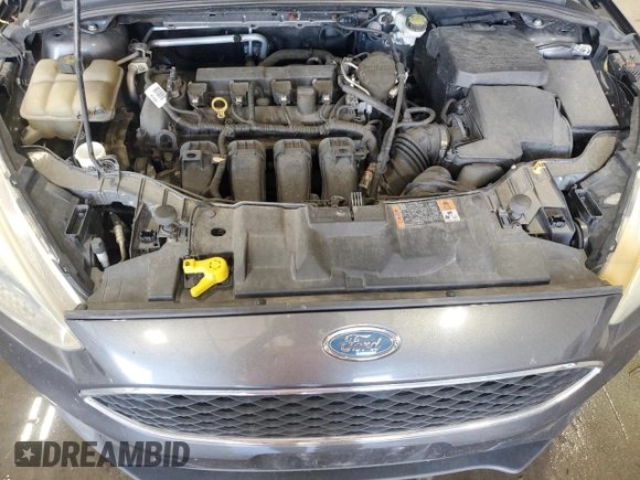 2015 Ford Focus SE with VIN 1FADP3F29FL310622, listed as a Copart auction lot 63591065 with 119,957 mi miles and Salvage title. Bid and sale history available at DreamBid. Image 11.