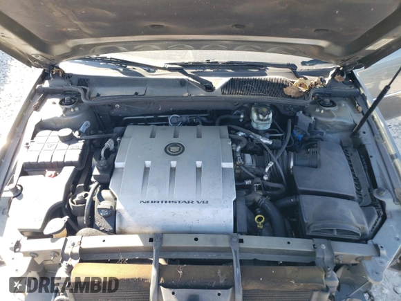 2008 Cadillac DTS 1SD z VIN 1G6KD57Y68U140938, wystawiony jako Copart lot #77525974 z przebiegiem 148 132 mil mil oraz Szkoda całkowita • Salvage title. Historia ofert i sprzedaży dostępna na DreamBid. Obrazek 11.