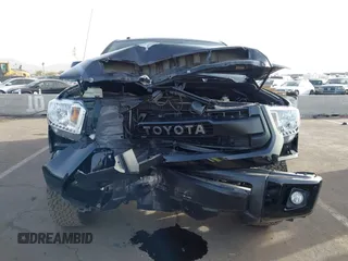 2017 Toyota Tundra 2WD SR5 with VIN 5TFEW5F19HX212397, listed as a IAAI auction lot 41677878 with 150,986 mi miles. Bid and sale history available at carsss.com. Image 12.