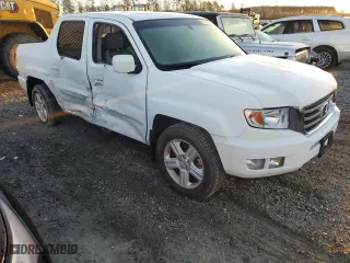 2012 Honda Ridgeline RTL with VIN 5FPYK1F57CB001679, listed as a Copart auction lot 85725924 with 80,916 mi miles and Salvage Title. Bid and sale history available at carsss.com. Image 4.