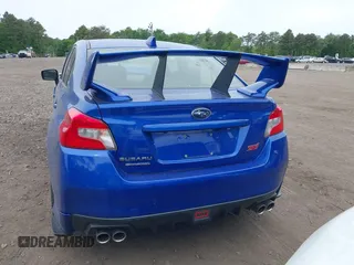 2020 Subaru WRX STI with VIN JF1VA2E61L9833954, listed as a IAAI auction lot 42336349 with 58,668 mi miles and . Bid and sale history available at DreamBid. Image 16.