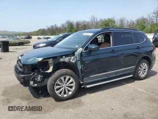 2018 Volkswagen Tiguan SEL with VIN 3VV2B7AX8JM154396, listed as a Copart auction lot 60984075 with 67,237 mi miles and Salvage title. Bid and sale history available at DreamBid. Image 1.