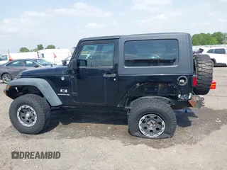 2008 Jeep Wrangler X with VIN 1J4FA24138L521983, listed as a IAAI auction lot 42263960 with 113,971 mi miles and . Bid and sale history available at DreamBid. Image 14.
