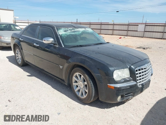 2006 Chrysler 300 C with VIN 2C3KA63H56H316500, listed as a IAAI auction lot 41811247 with 135,100 mi miles. Bid and sale history available at carsss.com. Image 1.