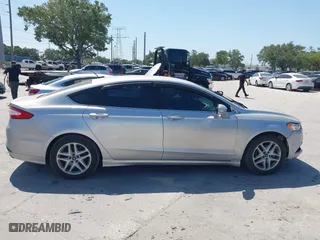 2016 Ford Fusion SE with VIN 3FA6P0H70GR275181, listed as a IAAI auction lot 42117448 with 111,446 mi miles. Bid and sale history available at carsss.com. Image 13.