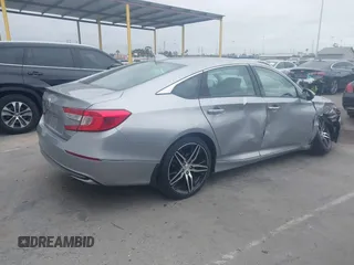2021 Honda Accord Touring with VIN 1HGCV3F99MA020450, listed as a IAAI auction lot 42194371 with 19,206 mi miles and . Bid and sale history available at DreamBid. Image 4.
