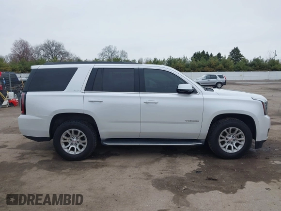 2016 GMC Yukon SLT with VIN 1GKS2BKC5GR374815, listed as a IAAI auction lot 41889495 with 163,464 mi miles. Bid and sale history available at carsss.com. Image 14.