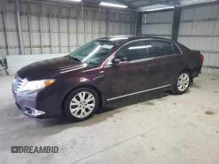 2012 Toyota Avalon z VIN 4T1BK3DB9CU471461, wystawiony jako Copart lot #60617565 z przebiegiem 170 780 mil mil oraz Czysty tytuł • Clean title. Historia ofert i sprzedaży dostępna na DreamBid. Obrazek 1.