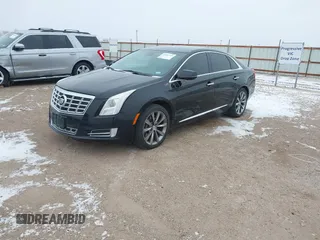 2013 Cadillac XTS Luxury with VIN 2G61R5S30D9100094, listed as a IAAI auction lot 41601711 with 191,068 mi miles and . Bid and sale history available at DreamBid. Image 2.