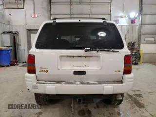 1997 Jeep Grand Cherokee Limited with VIN 1J4GZ78Y5VC747553, listed as a Copart auction lot 49125085 with 0 mi miles and Salvage Title. Bid and sale history available at carsss.com. Image 6.