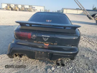 2000 Pontiac Firebird Formula z VIN 2G2FV22G4Y2175318, wystawiony jako Copart lot #68737224 z przebiegiem 229 394 mil mil oraz Szkoda całkowita • Salvage title. Historia ofert i sprzedaży dostępna na DreamBid. Obrazek 6.